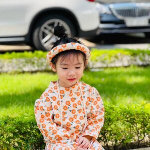 Bộ áo dài cách tân bé gái phối nơ Bộ Áo dài cách tấn bé gái màu cam hoa nhí